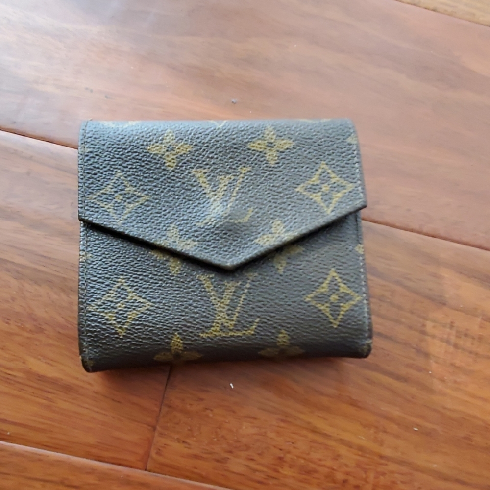Vintage Louis Vuitton monogram bifold wallet.